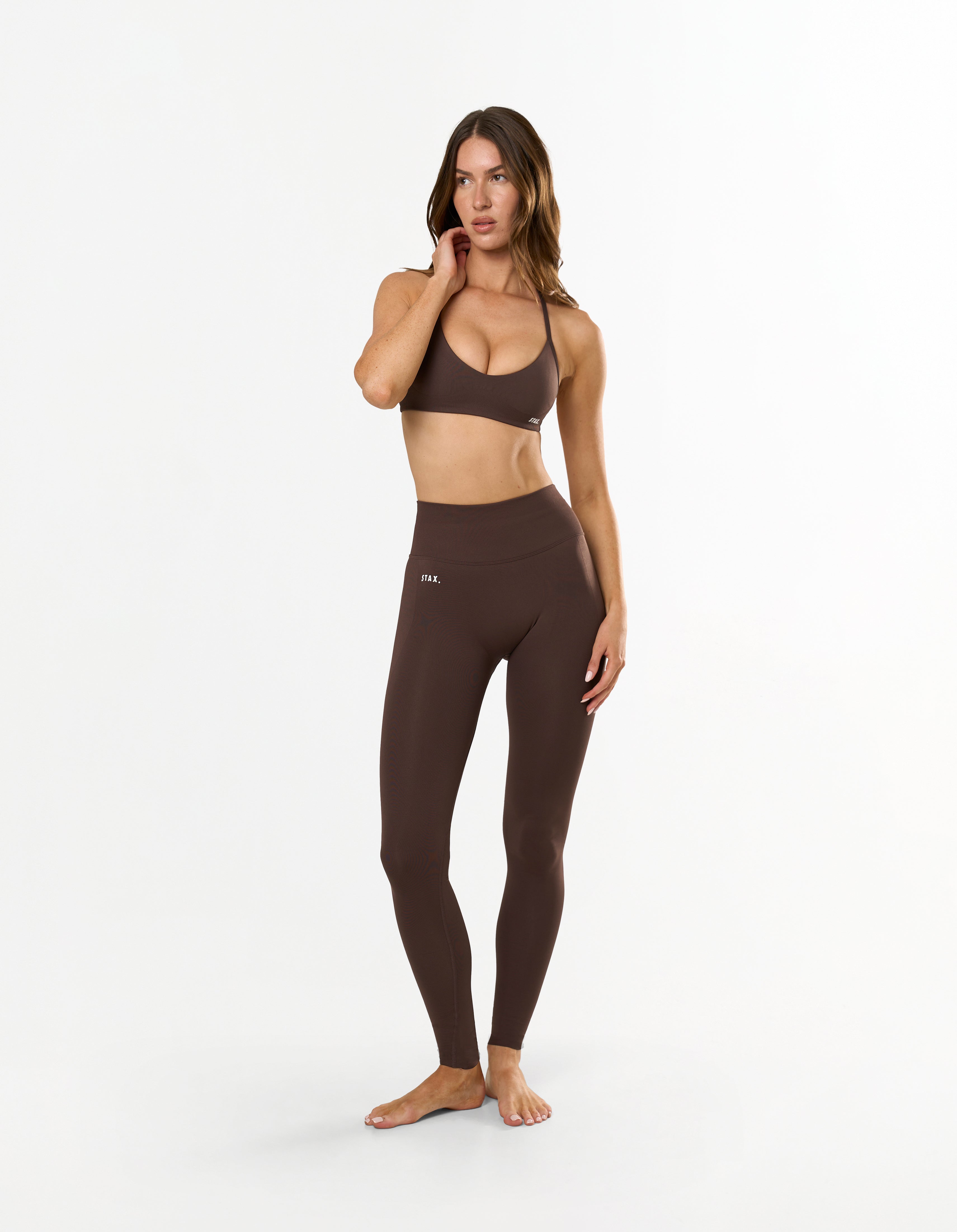 Front view of STAX. Premium Seamless Skulpt Bralette in Brown with removable padding/cups