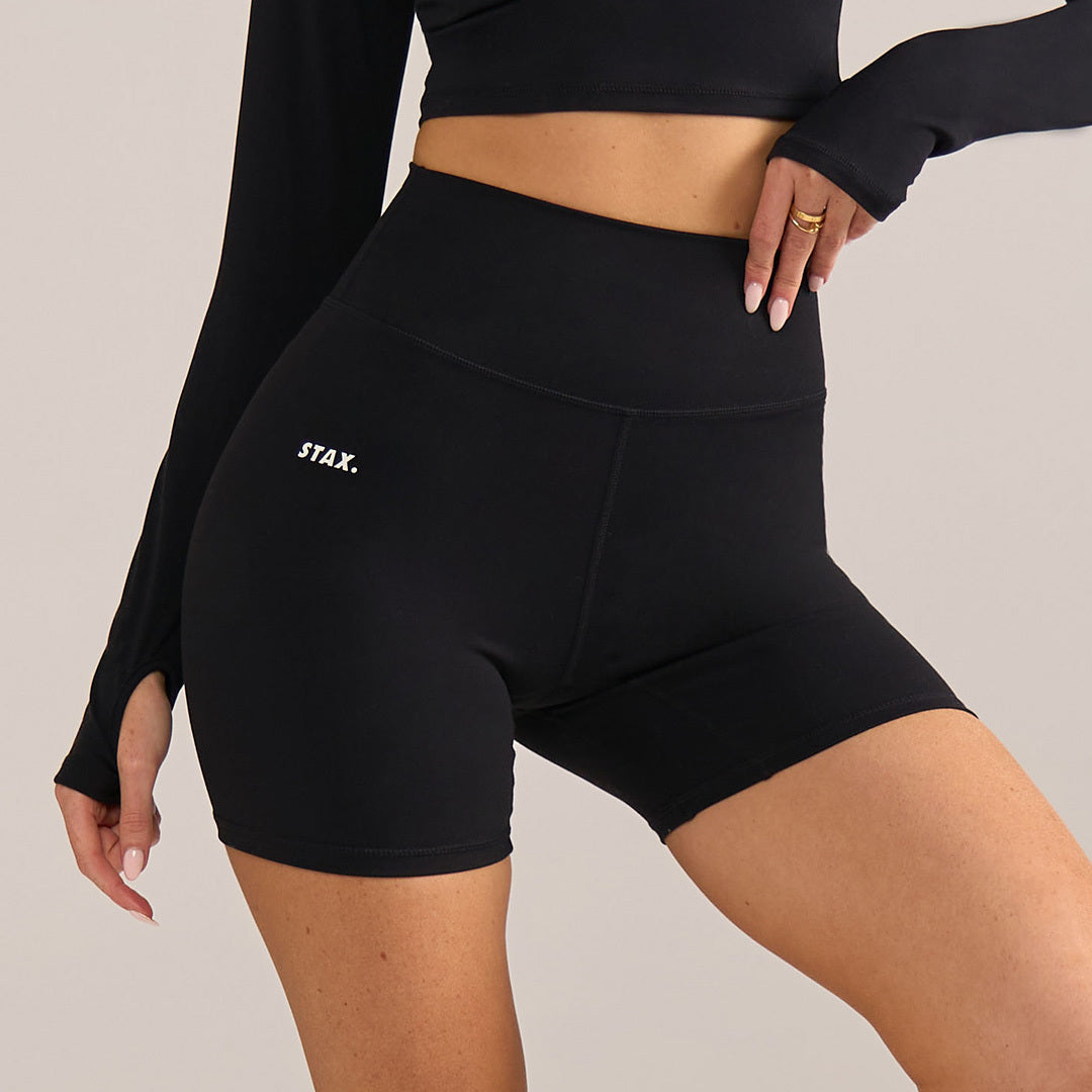 Close up of model wearing STAX. Activewear Bike Shorts