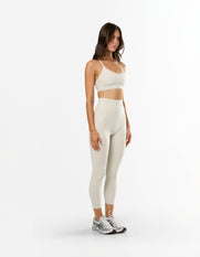 Side profile of STAX. NFS 7/8 Tights NANDEX™ in Oat showing high waist flattering fit