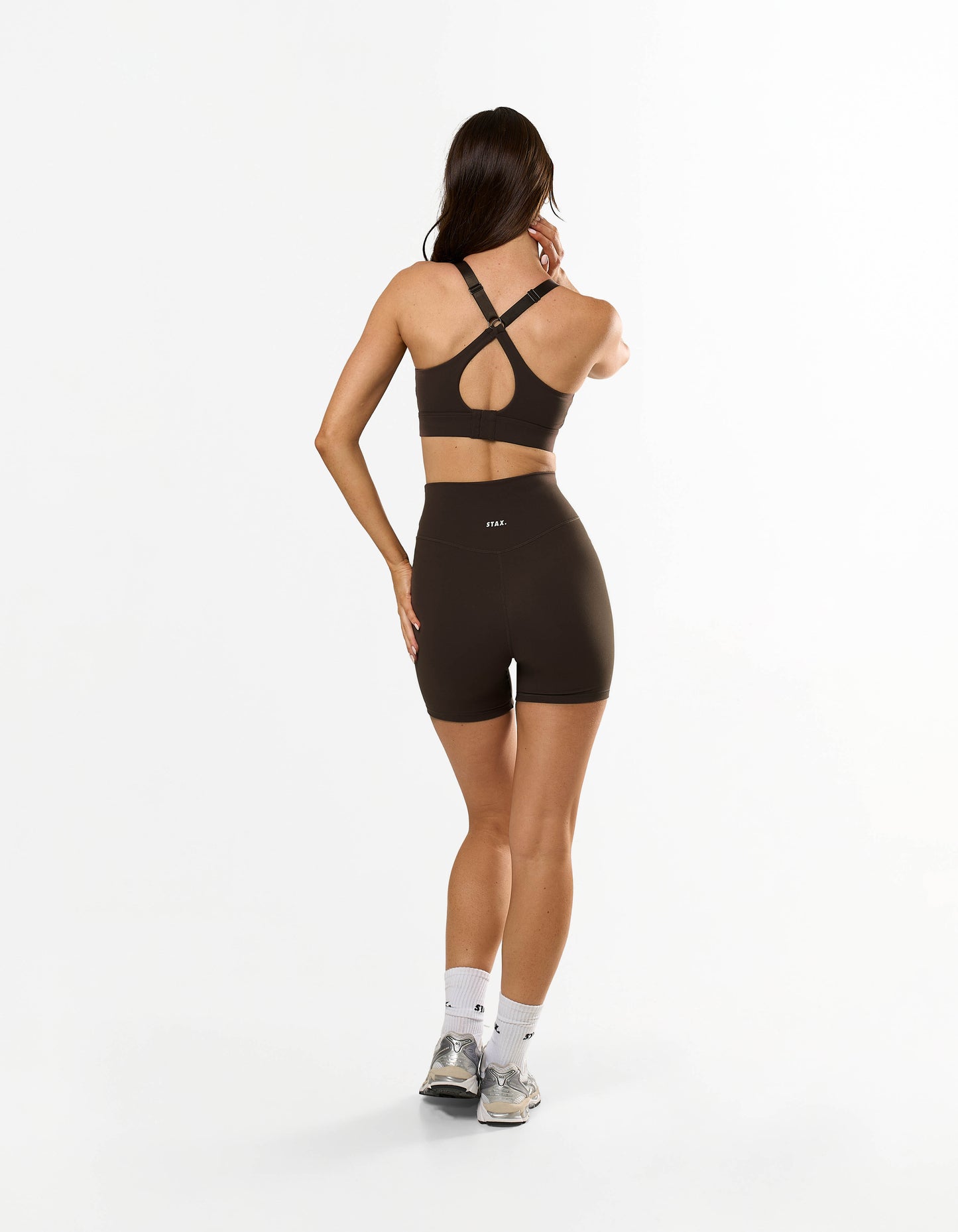Back view of STAX. Adapt Crop NANDEX™ in Espresso showing racerback design 