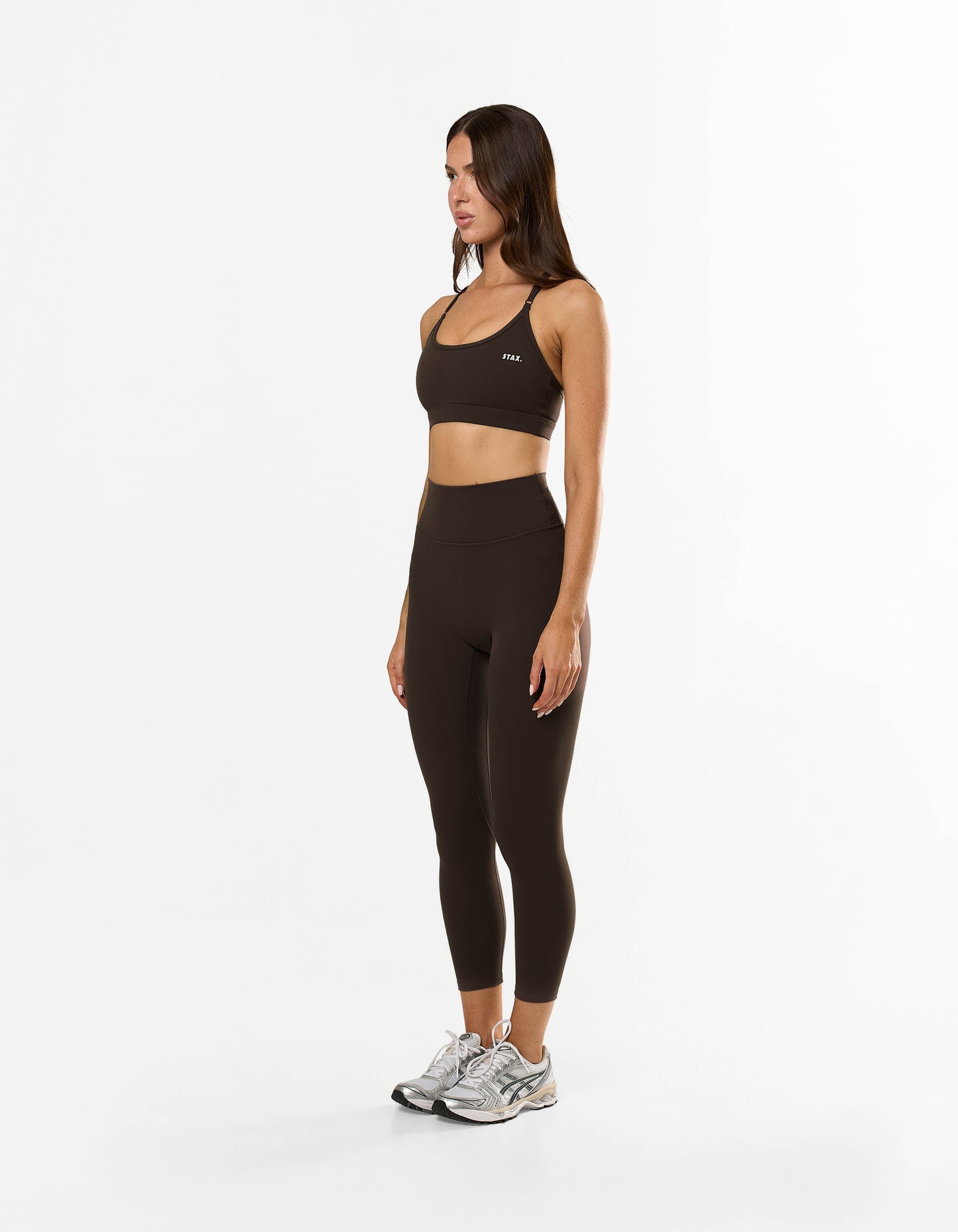 Side profile of STAX. NFS (No Front Seam) 7/8 Tights NANDEX™ in Espresso showing waist support to accentuate your shape  