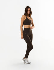 Front view of model wearing STAX. NFS (No Front Seam) Full Length Tights NANDEX™ in Espresso with matching Adapt Crop NANDEX™