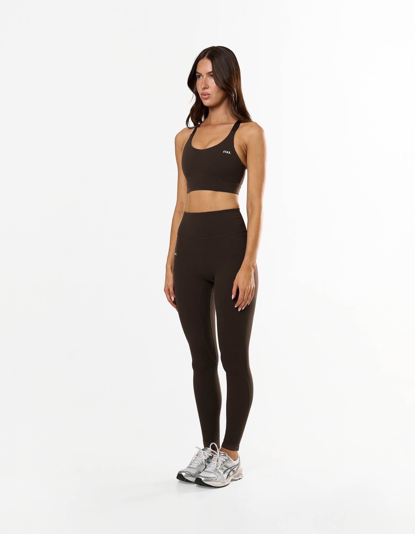 Side profile of STAX. Adapt Crop NANDEX™ in Espresso with matching full length tights