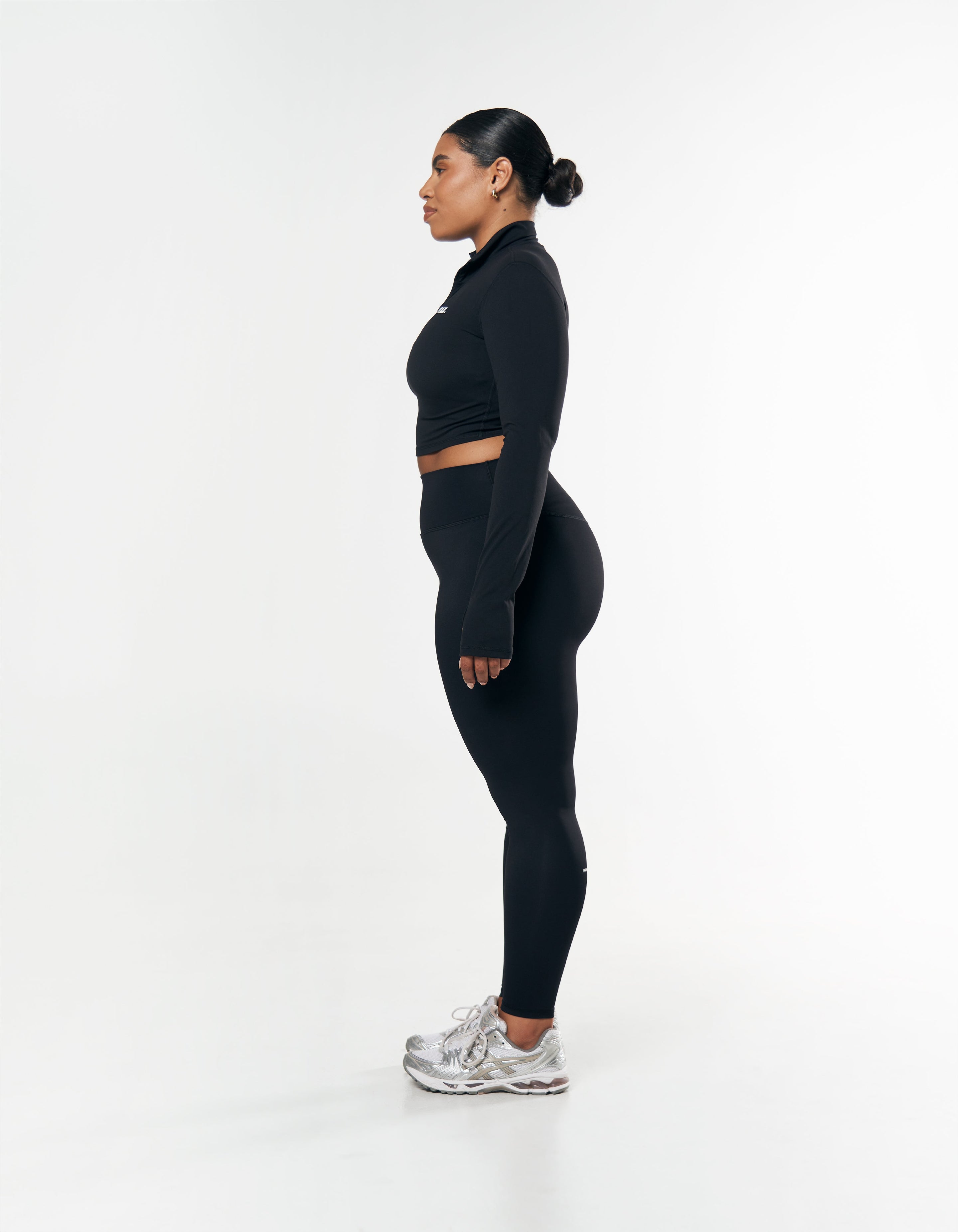 Side profile of STAX. Full Length Tights NANDEX ™ Original in Black showing flattering fit