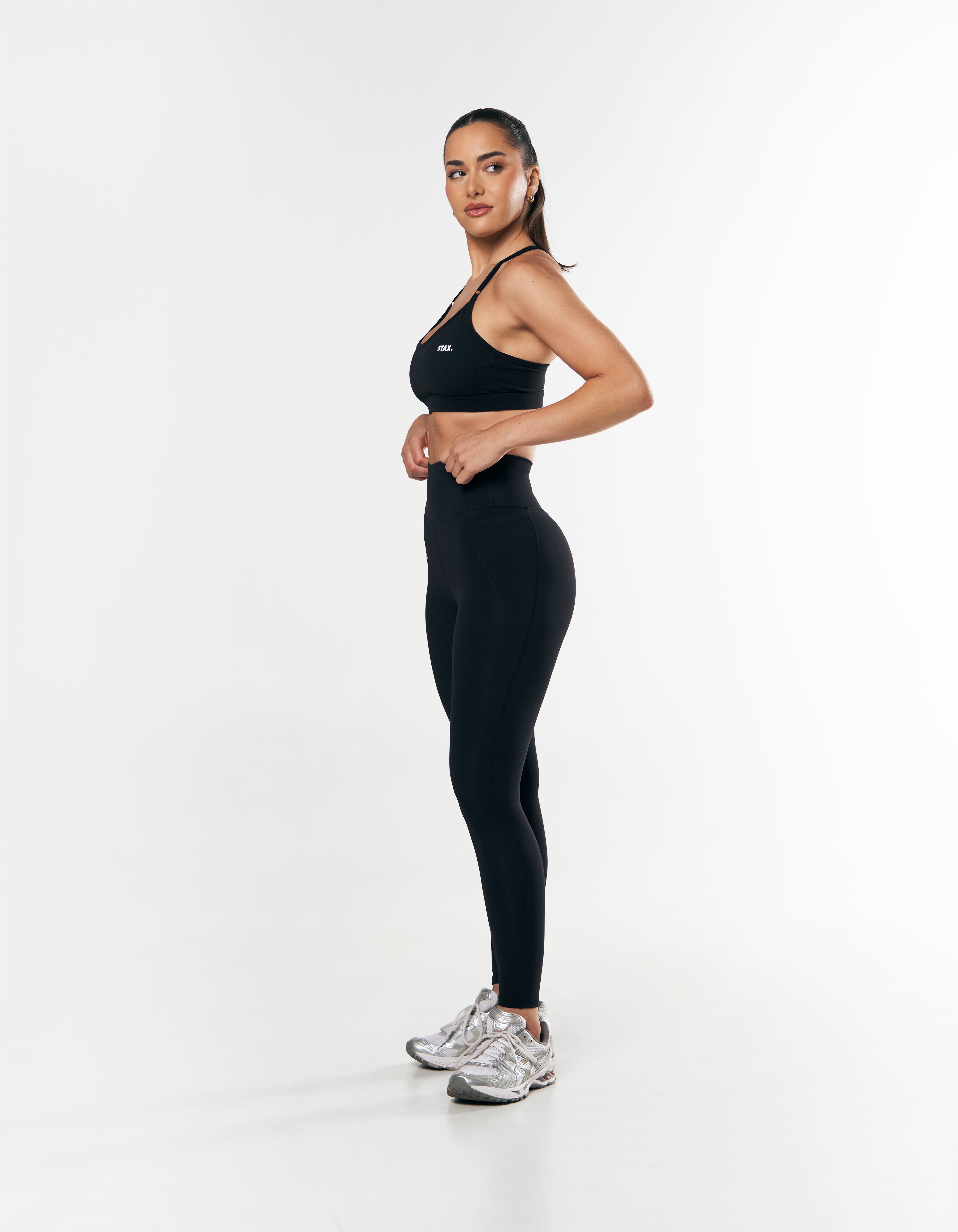 Exercise pants store with phone pocket