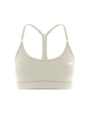 Flat lay front view of STAX. Strappy Crop NANDEX™ in Oat isolated on a white background