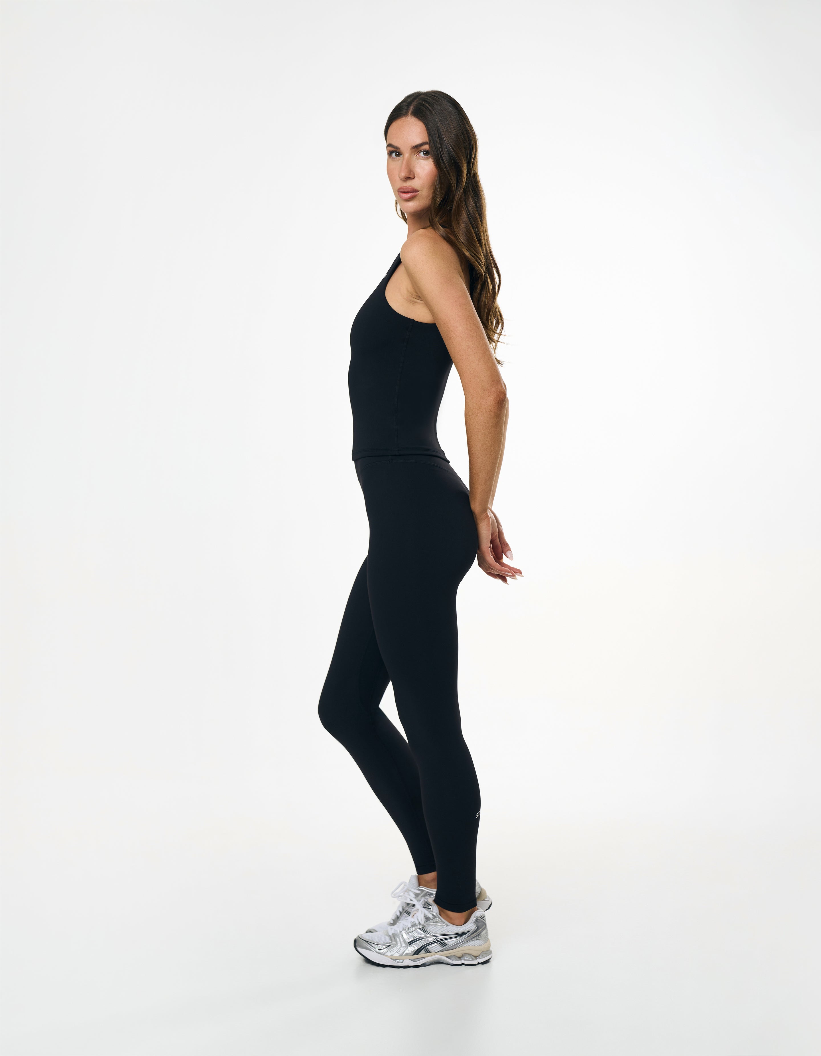 Side profile of STAX. Full Length Tights NANDEX™ Original in Black showing flattering tight fit and matching Body Tank NANDEX™