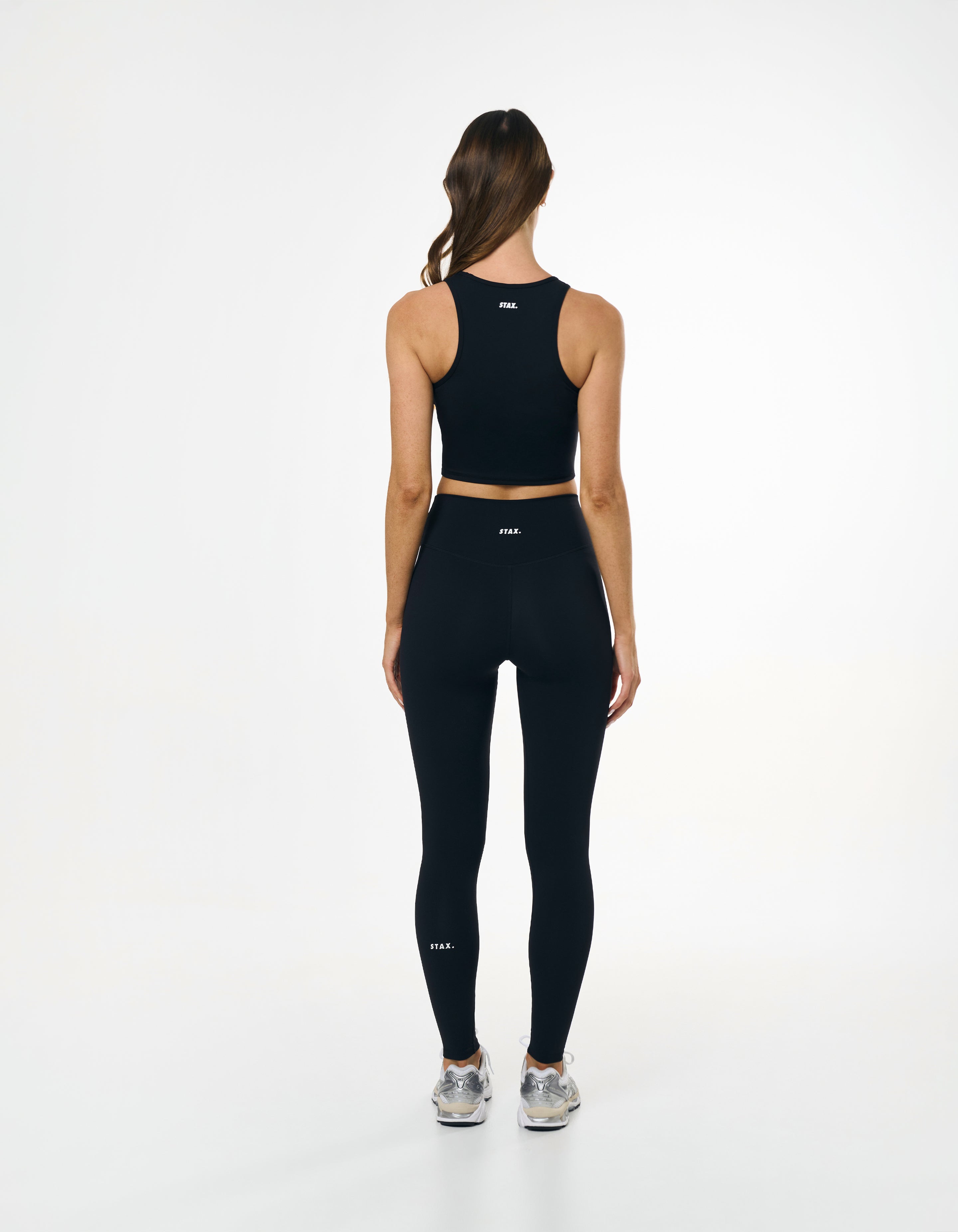 Back view of model wearing STAX. Full Length Tights NANDEX™ Original in Black with matching Cropped Tank NANDEX™ 